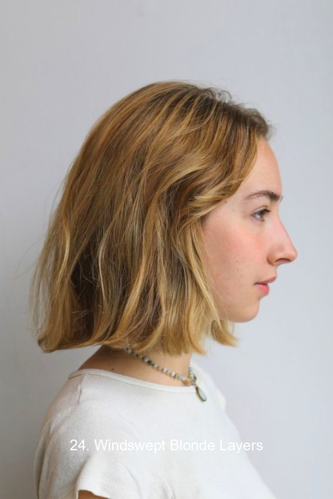 24. Windswept Blonde Layers