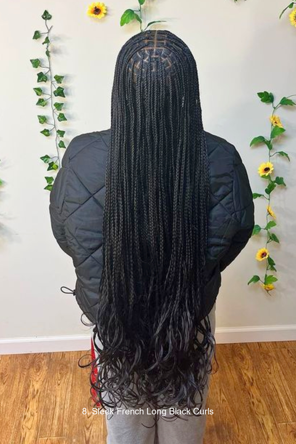 8. Sleek French Long Black Curls